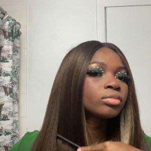 Brown synthetic wig with blonde streak